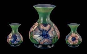 Moorcroft Handpainted Tube Lined Bulbous Vase - 'Anemone' Design On Green/Blue Ground. Signed To