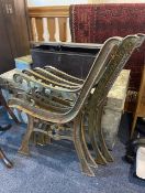 Four Cast Iron Bench Ends.