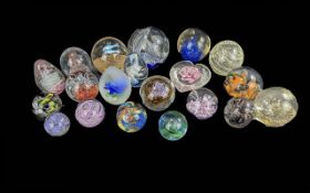 Collection of Glass Paperweights, various designs and colours, and various shapes.