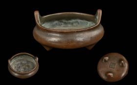 Small Antique Chinese Metal Censor on a tripod footed base, with a seal character mark to the