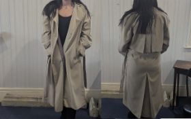 Ladies 'Savannah' Raincoat, size 14, beige double breasted with tie belt. 100% Polyester.