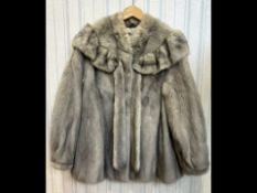 Ladies Sapphire Mink Jacket, collarless with ruffle shoulder and ties, full sleeves with cuff,