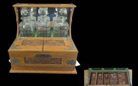 Antique Victorian Tantalus circa 1870, with key and sterling silver labels to decanters, complete