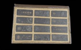 Antique Ching Dynasty 'Signs of the Zodiac' Ink Cakes with Qianlong fiv character marks, in fitted