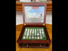 Danbury Mint Boxed Set of Never Circulated US Quarters, housed in a wooden glass fronted case,