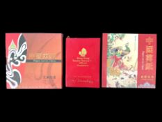 Two 'Paper Cut in China' Volumes, comprising one with birds and animals, and one 'Facial Makeup of