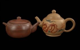 Two Brown Pottery Chinese Teapots with c