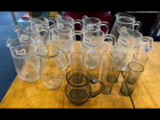 Ten Water Jugs, nine leaf patterned, one