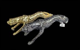 Pair of Decorative Leopard Figures, one