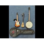 A Barnes and Mullins Banjo made in the USA together with a carry case. Along with a miniature base