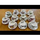 Royal Albert 'Flowers of the Month Series' Part Set, comprising eleven cups and saucers decorated