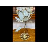 Decorative Table Lamp, in the form of a flower, with glass leaves edged in brass, on a brass base.