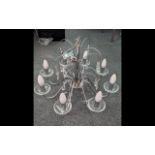 Chrome Chandelier Style Light Fitting, with eight branches and crystal prisms.
