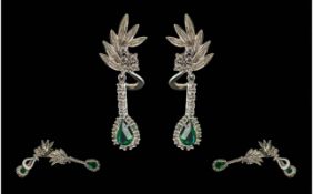 Ladies Fine Quality Platinum Diamond and Emerald Set Drop Earrings. Marked 950 Platinum. The Pair