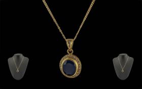 Ladies Attractive 18ct Gold Sapphire and Diamond Set Drop / Pendant, Attached to a 9ct Gold Chain.