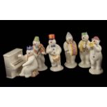 Royal Doulton Snowmen Band Set, to include Bass Drummer, Violinist, Cymbal Player, Drummer, and