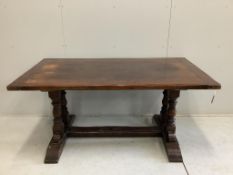 An 18th century style rectangular oak refectory dining table, width 167cm, depth 91cm, height