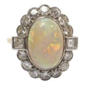 A mid 20th century 18ct, white opal, square and round cut diamond set oval cluster ring, size O,