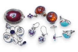 An Edwardian yellow metal, enamel and seed pearl set oval brooch, 25mm, a similar 9ct and gem set