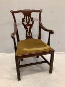 A George III Chippendale style mahogany elbow chair with a later similar elbow chair. Condition -