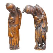 Two 19th century Chinese bamboo root figures of a fisherman and Shou Lao, tallest 32cm.