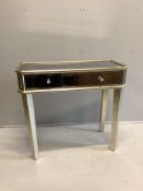 A Contemporary mirrored side table, width 92cm, depth 43cm, height 83cm. Condition - fair