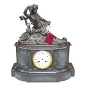 A Victorian black marble eight day mantel clock, surmounted by a cast bronze figure of a muse,
