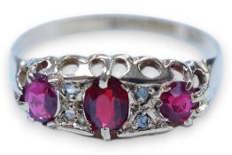 A George V 18ct gold, paste, doublet and diamond chip set half hoop ring, size P/Q, gross weight 2