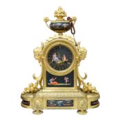 A French ormolu, black figural porcelain mounted mantel clock, 28cm wide x 36cm high. Condition -