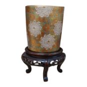 A Japanese Satsuma pottery lidded jar, Meiji period, decorated and gilded with flowers, signed to