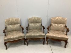 A set of three 18th century style carved walnut beech armchairs, width 59cm, depth 62cm, height