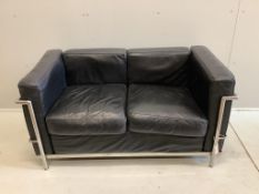 A Le Corbusier style two seater settee, width 130cm, depth 70cm, height 64cm. Condition - fair