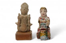 A Burmese lacquered wood figure, 19th century and an Indian terracotta figure of a deity, largest