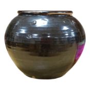 A Chinese Henan black glazed jar, Song dynasty, 23cm high. Condition - some glazing missing in