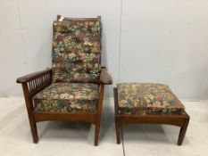 An early 20th century Morris style beech reclining armchair with a matching footstool, width 78cm,