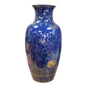 A Chinese gilt decorated blue glazed vase, early 19th century, 48.5cm high. Condition - one side has