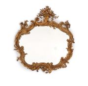 A 19th century French giltwood and gesso wall mirror of ornate asymmetrical scroll form with