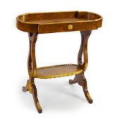 An early 19th century French ormolu mounted centre table with dish shaped oblong top and understage,