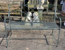 A painted metal garden bench, width 133cm, height 98cm. Condition - fair, some rusted areas