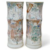 A pair of large Japanese Satsuma bamboo shaped vases, 45cm high. Condition - decoration worn on both