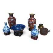 A collection of Chinese collectibles including cloisonné, yixing, etc. vases 18cm high.