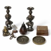 A pair of Japanese bronze candlesticks, two mirrors, a Buddha figure, box, carved hard stone