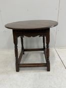 An 18th century style circular oak tea table, diameter 76cm, height 71cm. Condition - fair to good