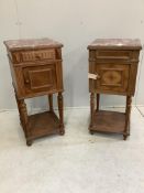 A near pair of late 19th or early 20th century French walnut marble top bedside cabinets, larger