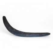 A late 19th early 20th century Australian Aboriginal boomerang, 56cm wide. Condition - good
