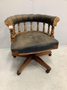 A Victorian style mahogany swivel desk chair, width 69cm, depth 57cm, height 70cm. Condition - fair