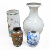 A Chinese blanc de chine vase and three Japanese vases, blanc de chine vase 33cm high. Condition -