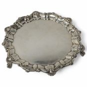 An Edwardian silver salver, maker C?, London, 1901, 17cm, with shell and scroll border, 21oz.