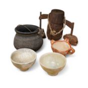 Four Burmese pottery vessels and a Burmese wooden elephant bell, bell 32cm wide. Condition - fair