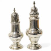 Two George III silver sugar casters, tallest 13.9cm, Thomas Daniell, London, 1775 and London,